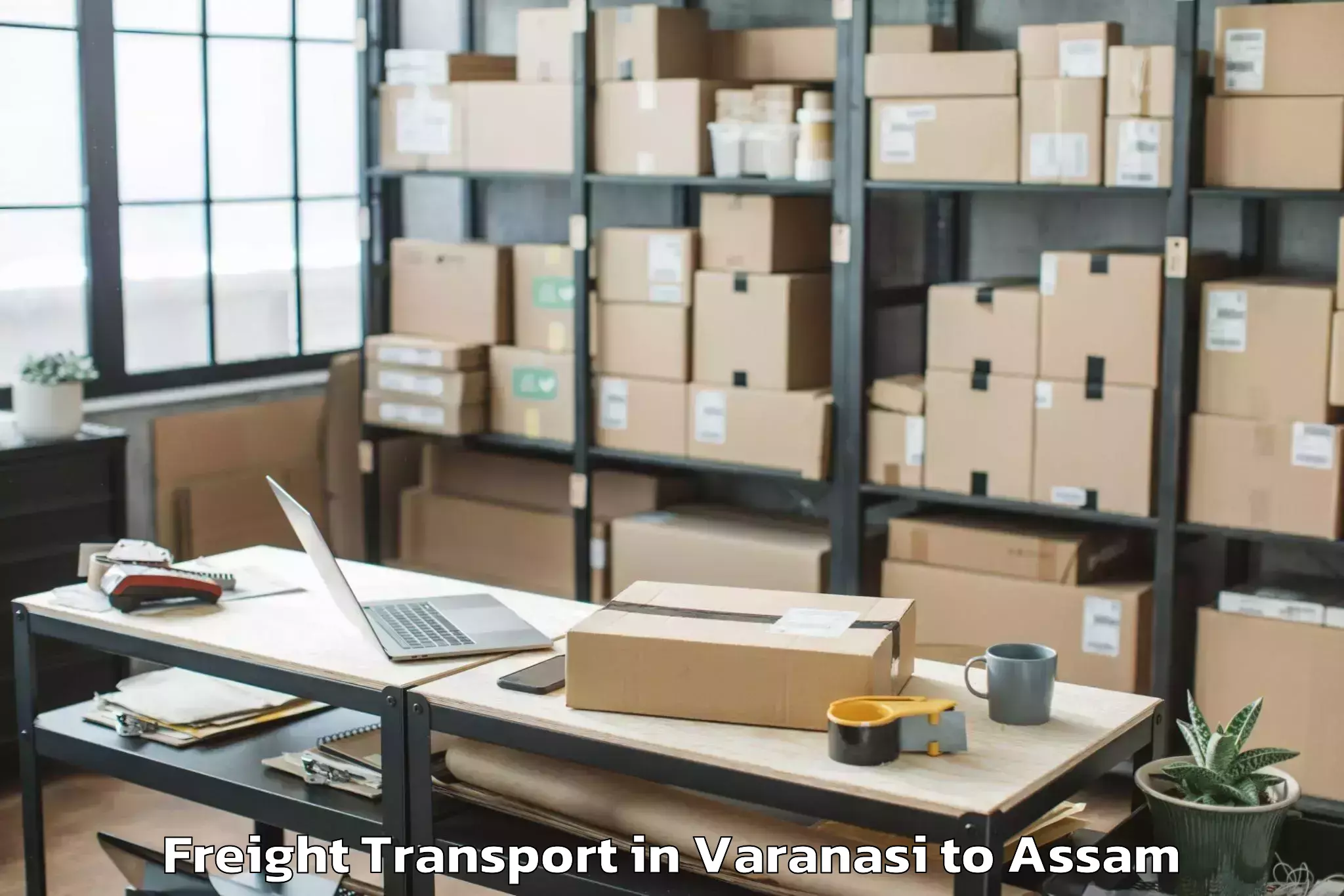 Varanasi to Lakhipur Freight Transport Booking